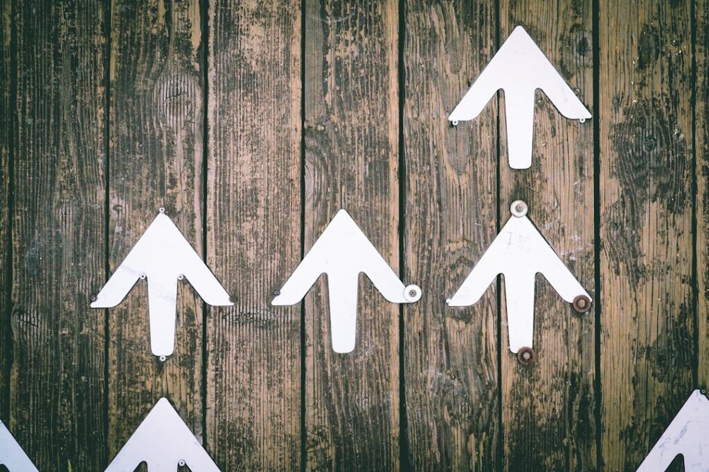 Upward arrows representing business growth and hosting upgrade decisions