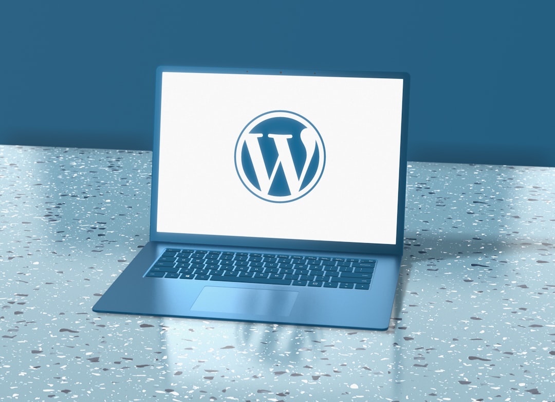 WordPress logo displayed on laptop screen representing affordable WordPress hosting options